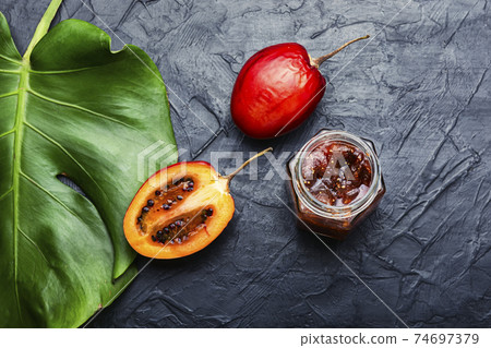 Jar of tamarillo jam. Jar of tamarillo jam. 74697379