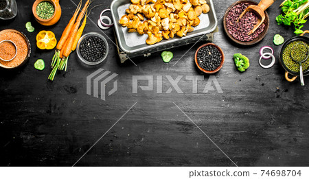 Organic food. Fresh vegetables and mushrooms. 74698704