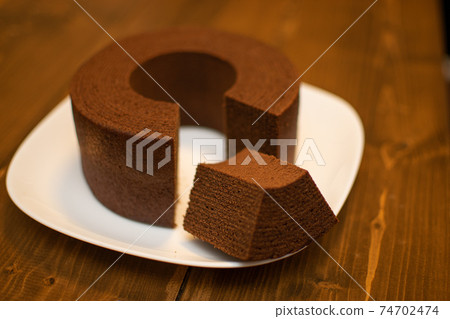 Baumkuchen with cut chocolate 74702474