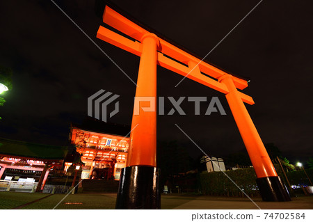 Torii at Fushimi Inari-taisha Shrine at night Torii at Fushimi Inari-taisha Shrine at night 74702584