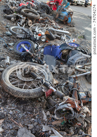 Photograph of a motorcycle damaged by the Great East Japan Earthquake taken on December 10, 2011 Kesencho, Rikuzentakata City, Iwate Prefecture 74704274