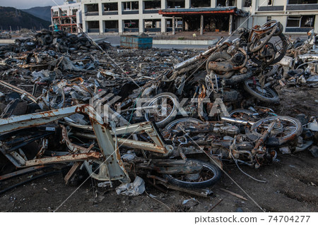 Photograph of a motorcycle damaged by the Great East Japan Earthquake taken on December 10, 2011 Kesencho, Rikuzentakata City, Iwate Prefecture 74704277