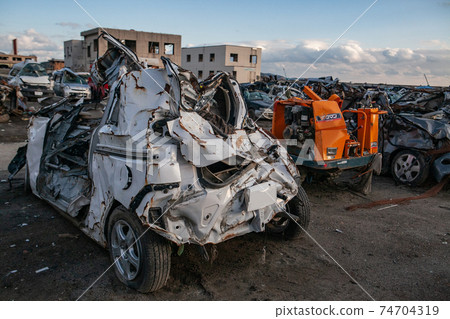 Photograph of a car damaged by the Great East Japan Earthquake taken on December 10, 2011 Kesennuma City, Miyagi Prefecture 74704319