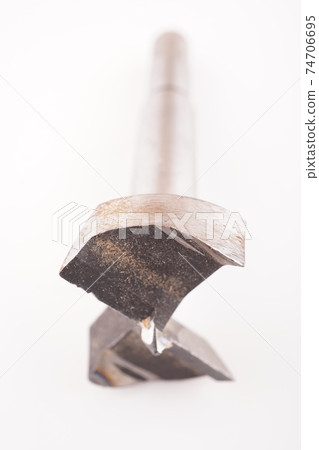 metal drill on a white background metal drill on a white background 74706695