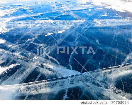 Colorful ice in winter on Lake Baikal in February 74708054
