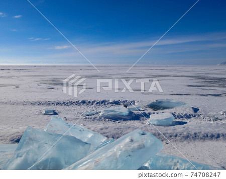 Colorful ice in winter on Lake Baikal in February 74708247