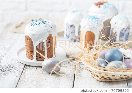 Easter table with Easter cakes 74709893