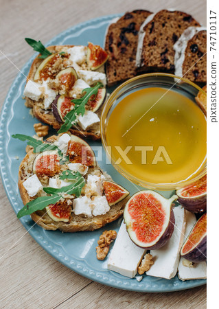 bread slicing plate honey cheese figs decorated bread slicing plate honey cheese figs decorated 74710117