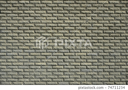 The texture of the wall is made of modern relief brown brick. Background image 74711234