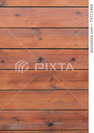 Varnished wood background from cabin exterior. Brown wood barn plank Varnished wood background from cabin exterior. Brown wood barn plank 74711468