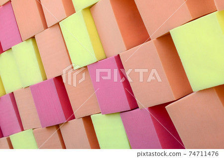 Wall of paralon soft cubes in dry pool, trampoline in the childrens center Wall of paralon soft cubes in dry pool, trampoline in the childrens center 74711476
