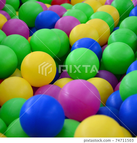Swimming pool for fun and jumping in colored plastic balls Swimming pool for fun and jumping in colored plastic balls 74711503