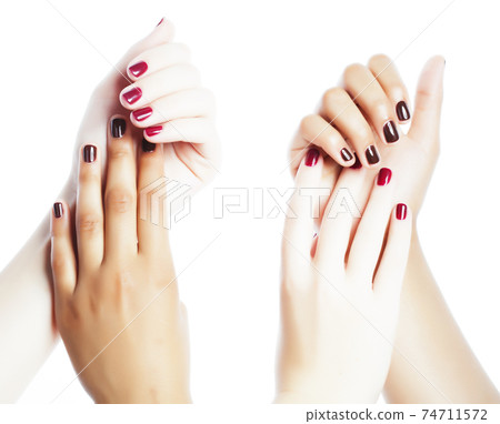 two different nathion manicured hands on white isolated, african with caucasian two different nathion manicured hands on white isolated, african with caucasian 74711572