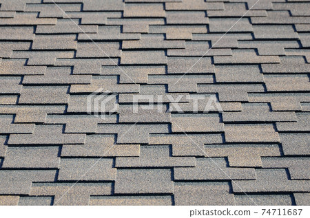 Modern roofing and decoration of chimneys. Flexible bitumen or slate shingles Modern roofing and decoration of chimneys. Flexible bitumen or slate shingles 74711687