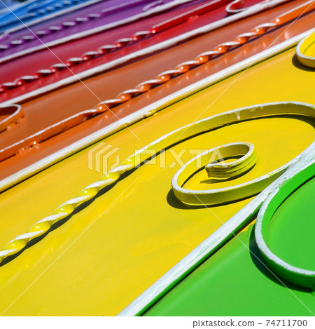 Metal texture of a piece of colored wall with a forged pattern 74711700