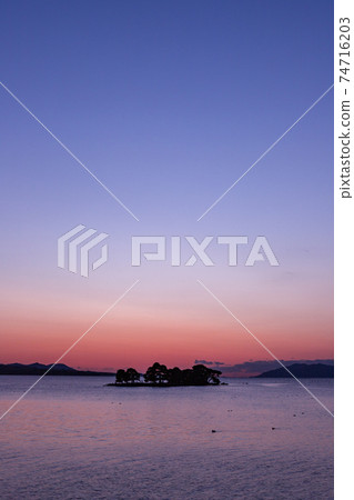 Sunset on Lake Shinji and scenery of Yomega Island Matsue City, Shimane Prefecture 74716203