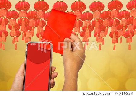 Chinese new year , Digital Hongbao or red envelope  are sending on cellphone. 74716557