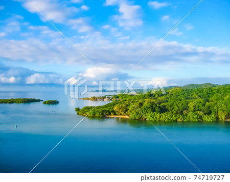 An aerial view of a tropical beach in Roatan Honduras 74719727