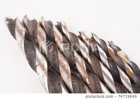 metal drill on a white background metal drill on a white background 74719849