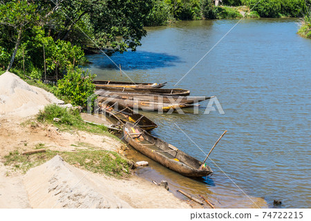 Dugout wooden boats on the river, Madagascar Dugout wooden boats on the river, Madagascar 74722215