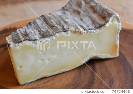 Moldy and aged natural cheese 74724408