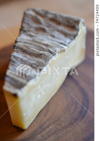 Moldy and aged natural cheese 74724409