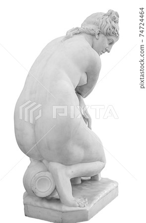 Ancient marble statue of a nude woman. Antique naked female sculpture. Sculpture isolated on white background Ancient marble statue of a nude woman. Antique naked female sculpture. Sculpture isolated on white background 74724464