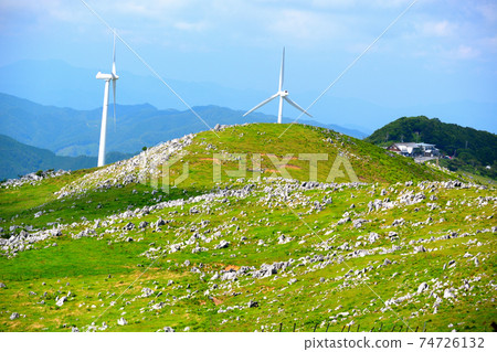 Shikoku Karst, a landmark of Himezurudaira, a landscape with a windmill, Ehime prefecture, Kochi prefecture (2) 74726132