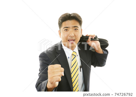 Running businessman 74726792