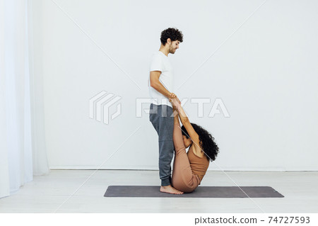 Male and female paired yoga asana gymnastics fitness 74727593