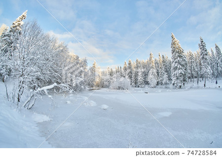 frozen river. snowy beautiful winter 74728584