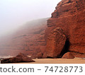 marsian-like mistic foggy landscape of clay rocks 74728773