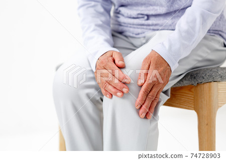 Senior woman suffering from knee osteoarthritis without face Senior woman suffering from knee osteoarthritis without face 74728903
