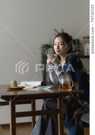Young woman enjoying home time 74730185
