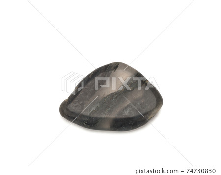 macro shooting of natural stone - black quartz mineral gem stone isolated on white background 74730830
