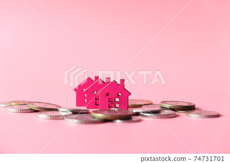 colorful wooden houses on white , the concept of finance concept 74731701