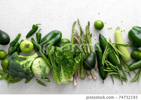 Green vegetables. Fresh green produce. Healthy vegetarian food concept background. Flat lay. Top down view 74732193