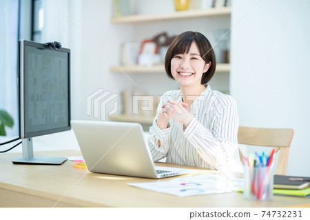 Female telework teleworking personal computer online meeting 74732231