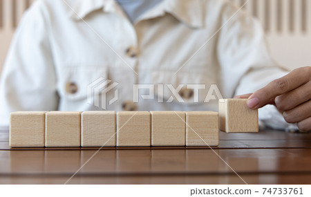 Wooden block with copy spase or Fill in the blank, Wooden toys, An empty space to fill up seven characters, Arrange the dice horizontally. 74733761