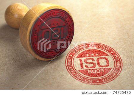 ISO 9001 certified concept. Rubber stamp with the text ISO 9001 on craft paper background. Quality control. ISO 9001 certified concept. Rubber stamp with the text ISO 9001 on craft paper background. Quality control. 74735470