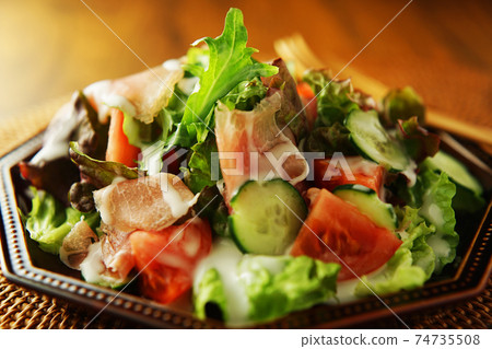 Prosciutto and tomato vegetable salad Prosciutto and tomato vegetable salad 74735508