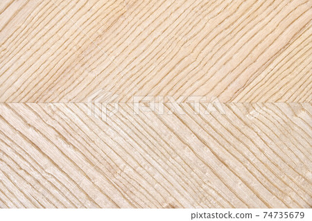 Wooden panel of ash veneer with stylish herringbone texture Wooden panel of ash veneer with stylish herringbone texture 74735679
