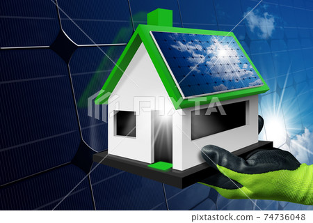 Hand with Work Glove Showing a Small Model House with Solar Panel on the Roof Hand with Work Glove Showing a Small Model House with Solar Panel on the Roof 74736048