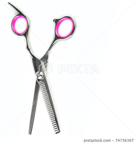 pairs of hairdressing scissors for hair cutting. isolated. Free space for text. pairs of hairdressing scissors for hair cutting. isolated. Free space for text. 74736307