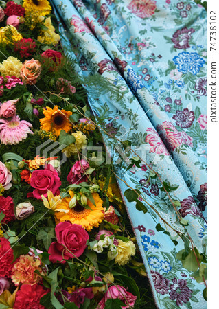 flowers and colored fabric for a holiday dress in valencia 74738102
