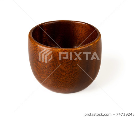 Brown wooden bowl isolated on white background. Empty dishes for food design. Brown wooden bowl isolated on white background. Empty dishes for food design. 74739243