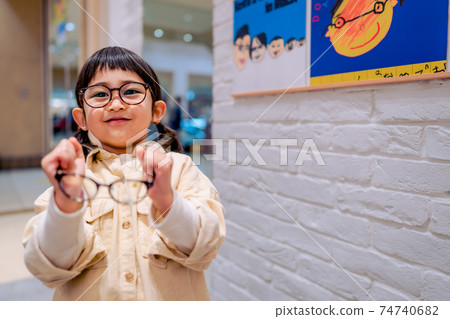 Girls wearing glasses Girls wearing glasses 74740682