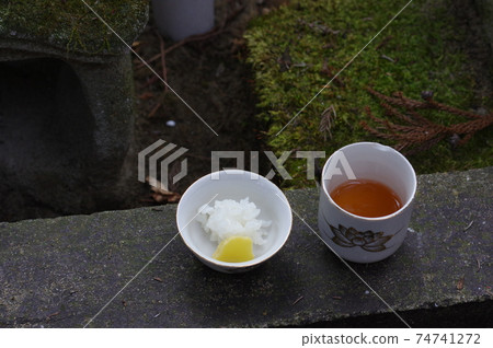 Rice and tea offered to pray for daily well-being 74741272