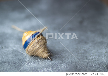 Classic wooden spinning top toy with string 74741460