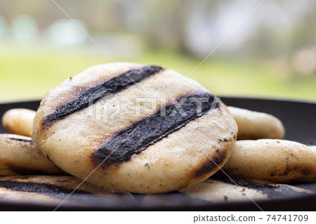 Arepas, typical Venezuelan and Colombian food. 74741709
